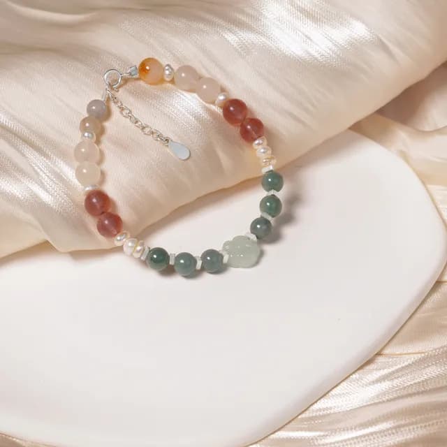Lắc bạc phối thạch anh dâu tây, moonstone, ngọc trai, ngọc phỉ thuý xanh và hoa trà ngọc